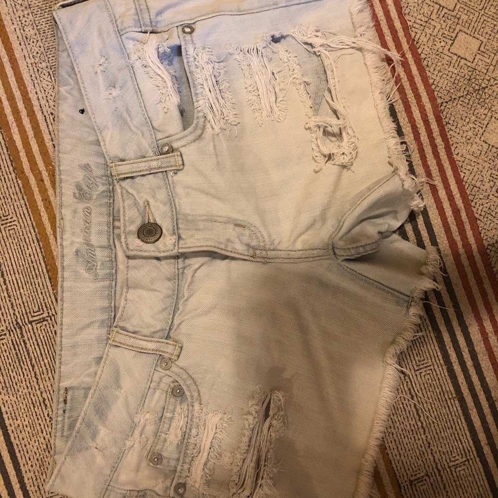 American Eagle light wash distress shorts.